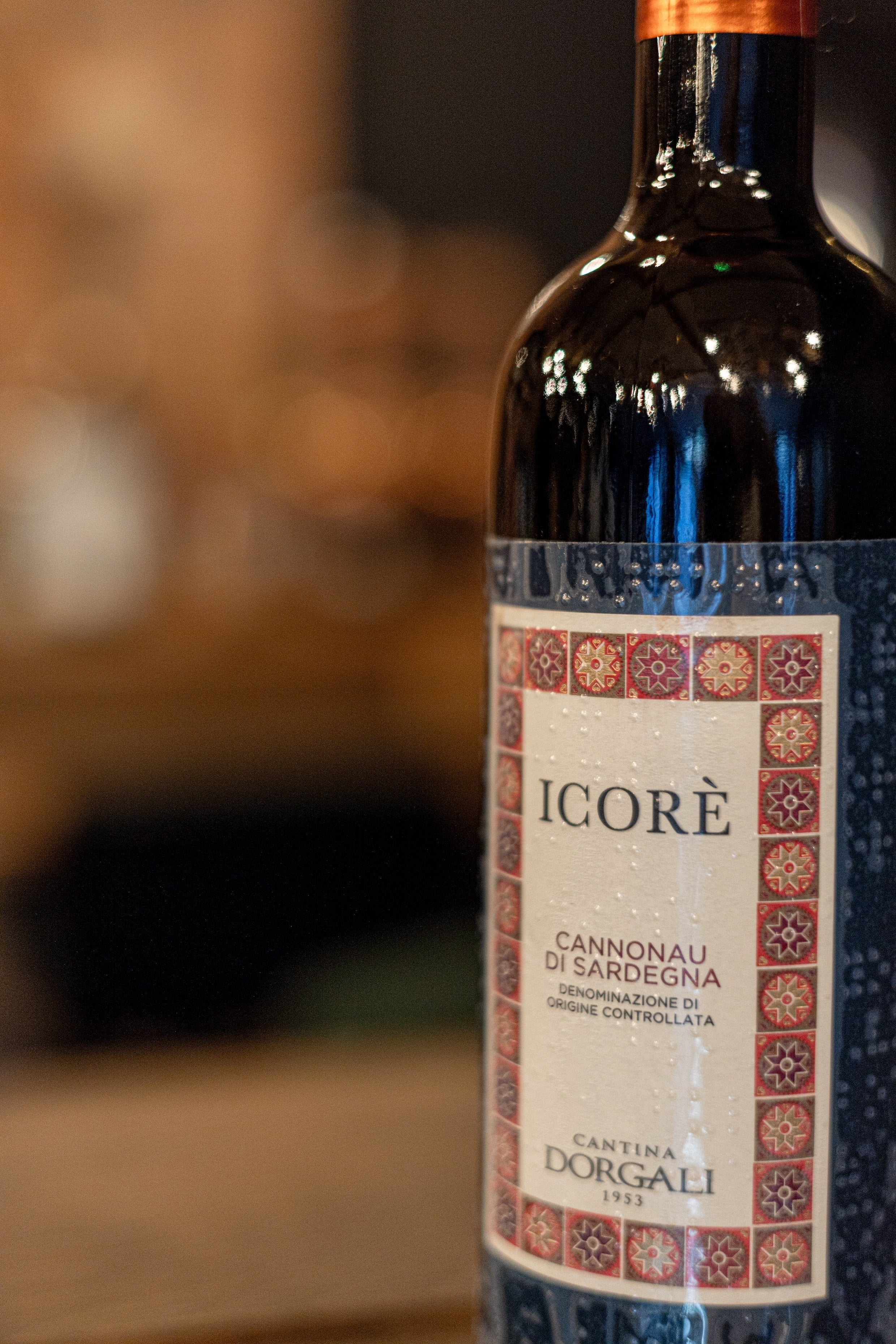 Bottle of Sardinian Icore wine with braille label