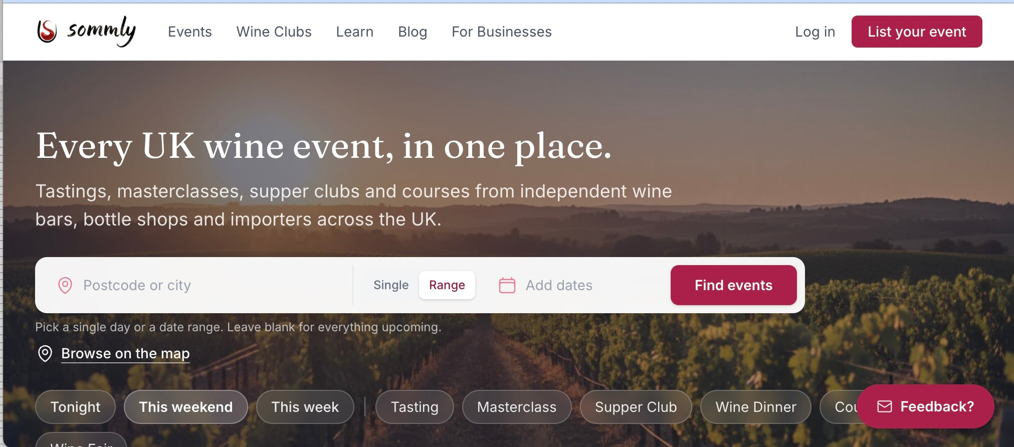 Screen shot of Sommly home page with the world: Every UK Wine Event, In One Place